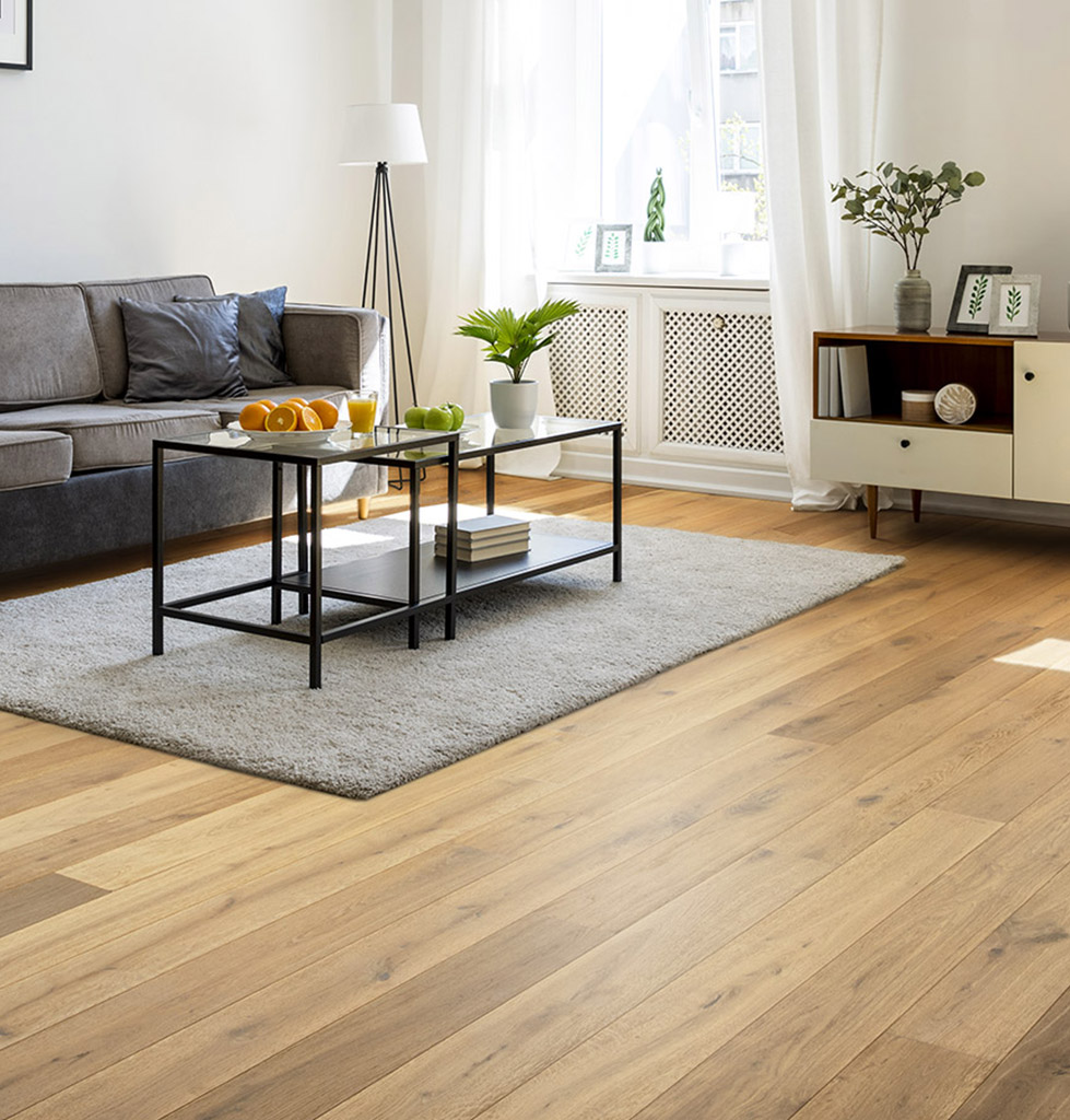 Elegant living room featuring rich, dark Amarone floors contrasted with white walls and minimalist furniture, creating a sophisticated and modern atmosphere.